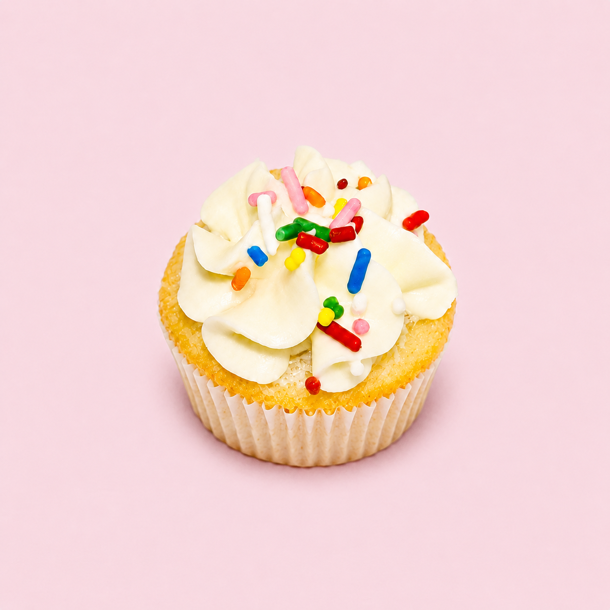 Vanilla cupcakes on the signature Selly pink background